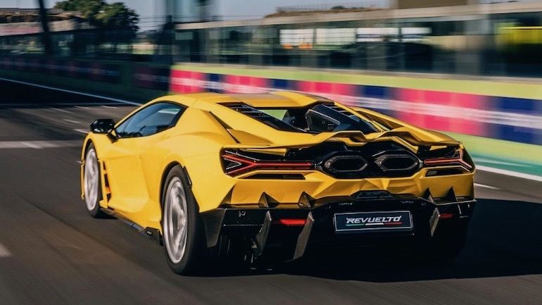 Lamborghini Revuelto A yellow road track car on the raceway, a Lamborghini Revuelto speeding along.