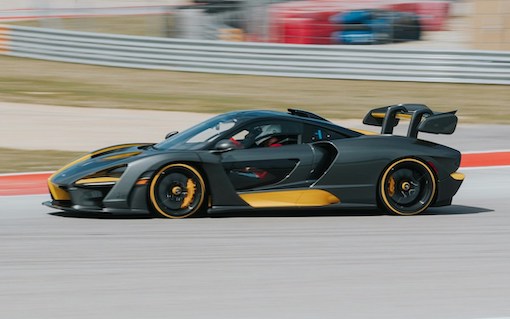 McLaren header copy McLaren Street legal racing car black and yellow racing on track at a motorsports country club and private racetrack in defuniak.